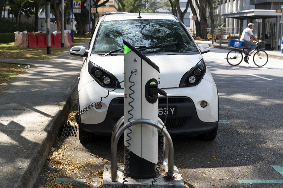 Things could start to change this month. As of May 4, some EVs will be moved from Category B (generally reserved for cars with larger engine capacities) to Category A, typically the segment that attracts the lowest COE premiums. (Photo by Bloomberg)